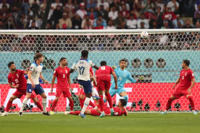 Bukayo Saka scores England's second.