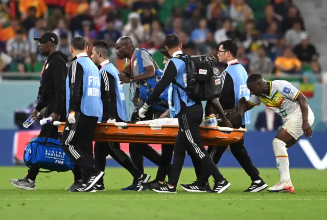 Cheikhou Kouyate is stretchered off