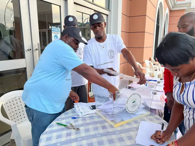 Electoral officials count votes as the voting ends for presidential, legislative elections in Malabo, Equatorial Guinea on November 20, 2022.