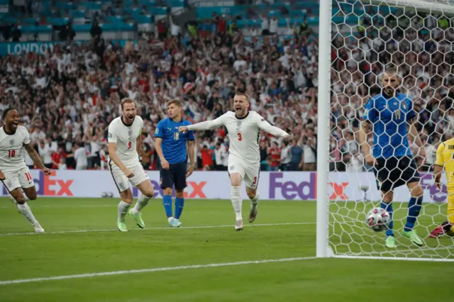 Luke Shaw celebrates scoring against Italy at Euro 2020