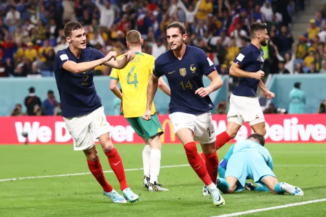 Adrien Rabiot wheels away in celebration