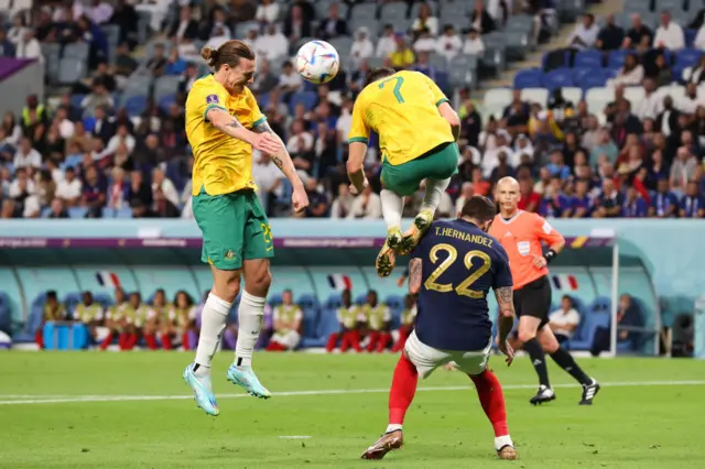 Jackson Irvine heads towards goal