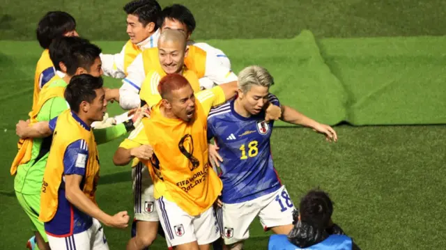 Takuma Asano scoring against Germany