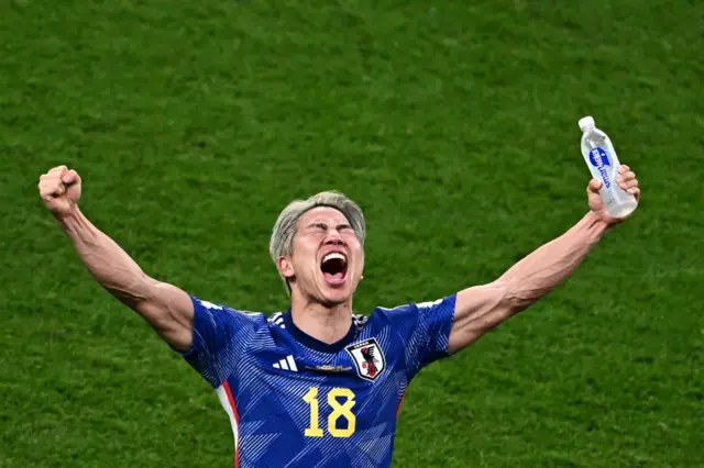 Japan celebrating their win over Germany