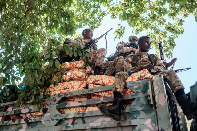 Members of the Amhara Special Forces seat on the top of a truck in the city of Alamata, Ethiopia, on December 11, 2020.