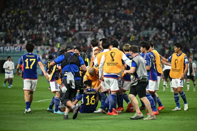 Japan celebrate beating Germany