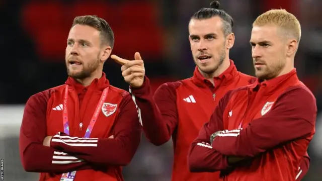 Gareth Bale (centre) and Chris Gunter (left) with Aaron Ramsey (right)