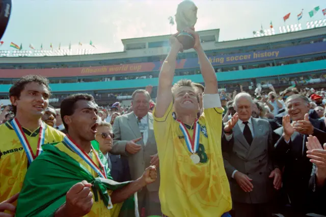 Dunga holds the World Cup in 1994