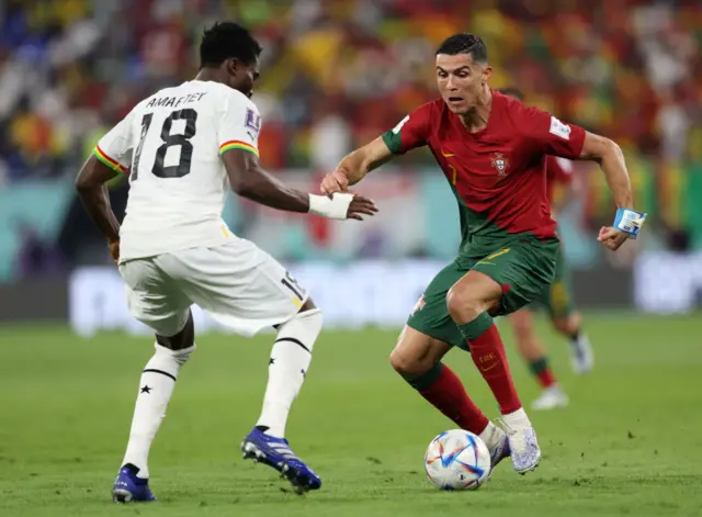 Cristiano Ronaldo of Portugal controls the ball against Daniel Amartey of Ghana