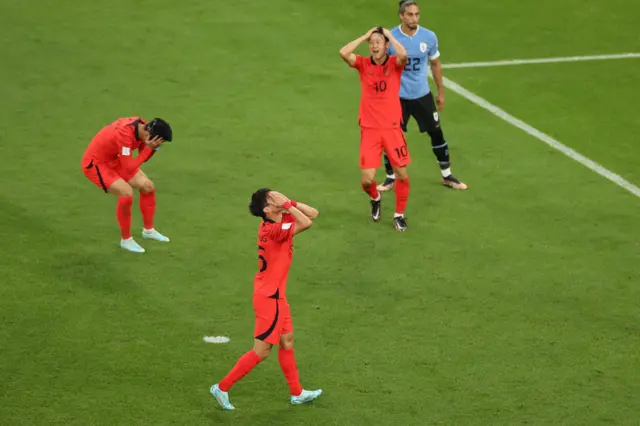 South Korea players react to a big miss