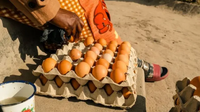 Woman selling eggs in Zimbabwe