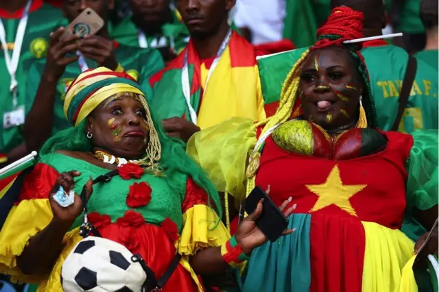 Cameroonian football fans dress up in their finest as the Indomitable Lions take on Switzerland