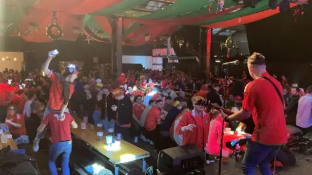 Wales fans in a Cardiff venue