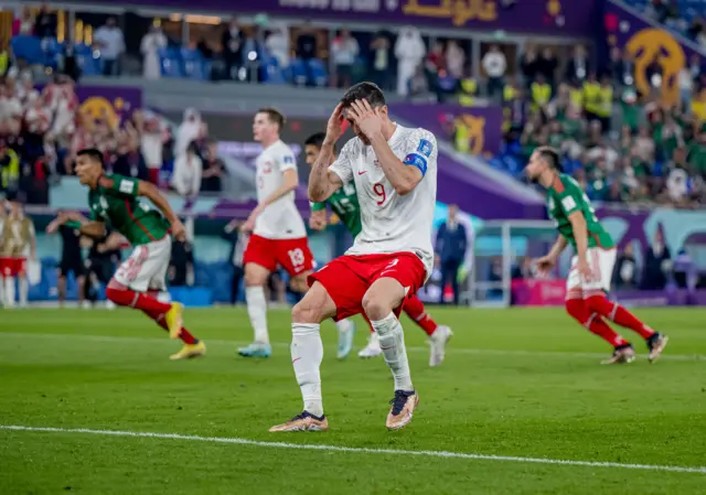 Poland striker Robert Lewandowski looks dejected after missing a penalty against Mexico in the 2022 Fifa World Cup