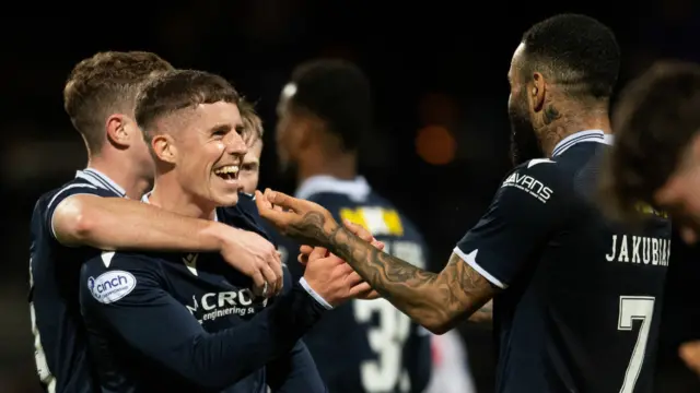 Dundee celebrate Luke McCowan's goal