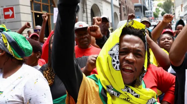 Members of African National Congress Youth League demonstrate outside Cape Town's High Court against the South African Constitutional Court's ruling to release Chris Hani's killer, Janusz Walus, on parole in Cape Town, South Africa, November 24, 2022