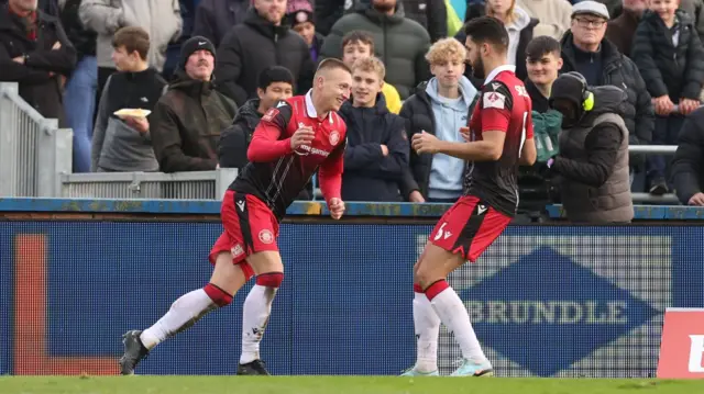 Luke Norris celebrates his second goal