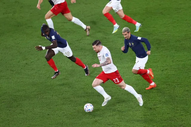 Pierre-Emile Hojbjerg (23) of Denmark in action againstDayot Upamecano (L) of France during the FIFA World Cup Qatar 2022 Group D match between France and Denmark at Stadium 974 in Doha, Qatar