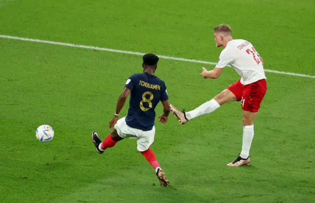 Andreas Cornelius shoots against France