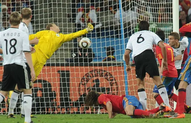 Carlos Puyol scores against Germany in 2010