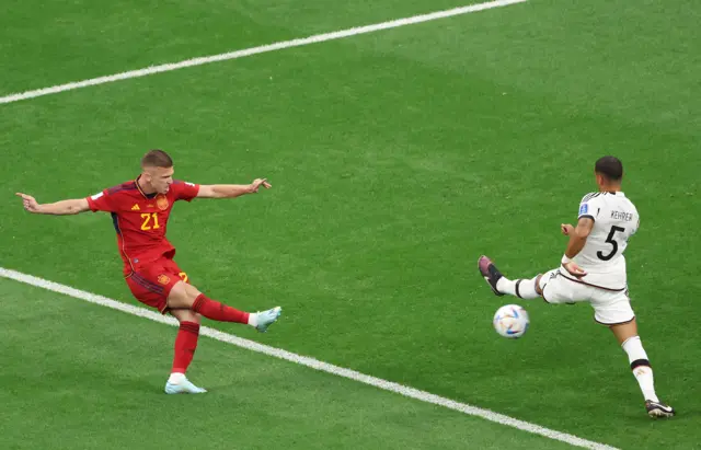 Spain's Dani Olmo has a shot against Germany