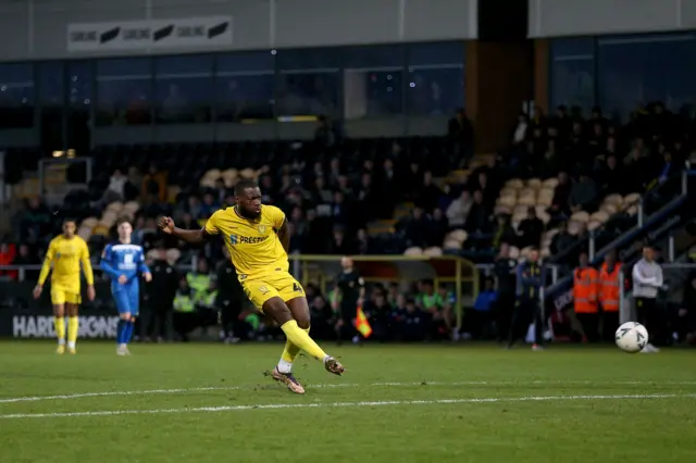 Deji Oshilaja scores his second and Burton's sixth