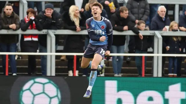 Ged Garner celebrates his goal for Fleetwood