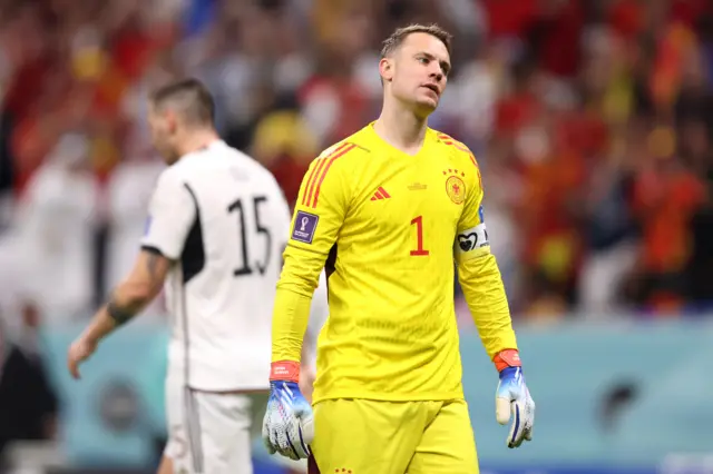 Manuel Neuer looks dejected after Spain score