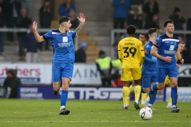 Harry Parsons celebrates scoring for Chippenham