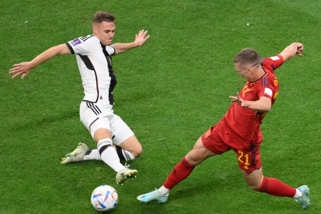 Joshua Kimmich fouls Dani Olmo