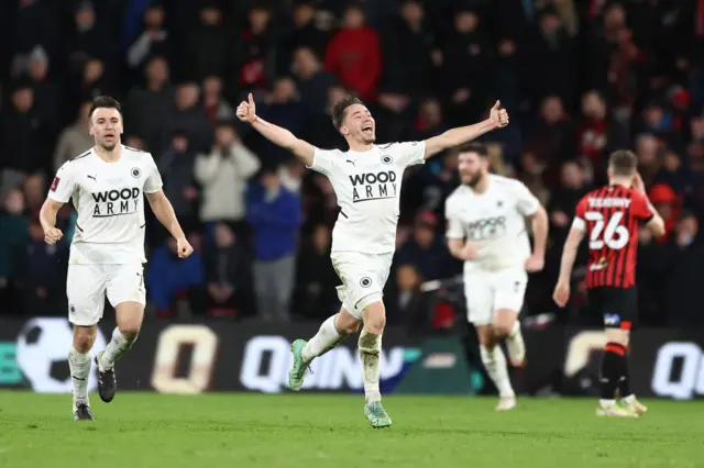 Boreham Wood celebrate their FA Cup win over Bournemouth