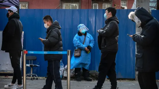 People line up for Covid tests in Beijing on 27 November