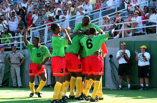 Cameroon celebrating a goal against Sweden in 1994