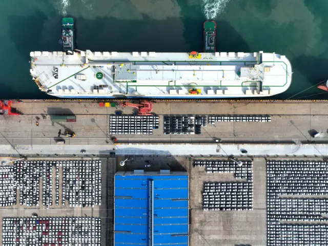 Roll-on wheels are docked at berth 59 to load vehicles for export at the Port Dongfang Terminal in Lianyungang,