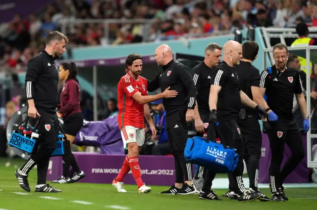 Rob Page comforts Joe Allen