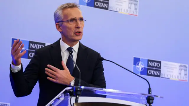 Jens Stoltenberg speaking at news conference