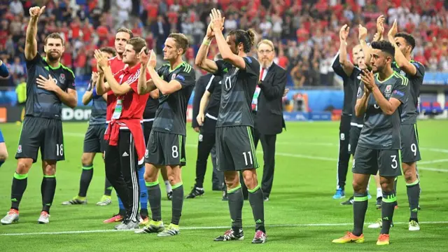 Wales players after loss to Portugal