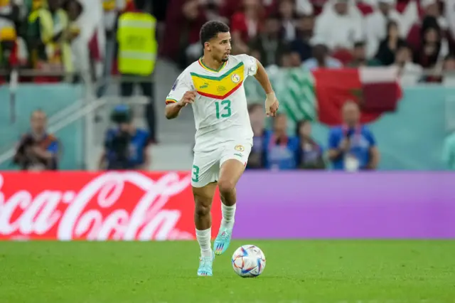 Iliman Ndiaye of Senegal controls the ball during the FIFA World Cup Qatar 2022 Group A match between Qatar and Senegal at Al Thumama Stadium on November 25, 2022 in Doha