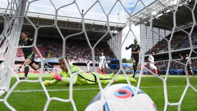 Joe Hart watches on as Wales celebrate