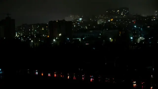 Reduced energy consumption is seen in a darkened residential area of Chisinau