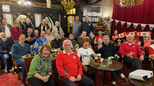 Football fans at the Baildon Hall Club in West Yorkshire