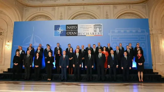 Nato foreign ministers pose for a family photo during a meeting in Romania