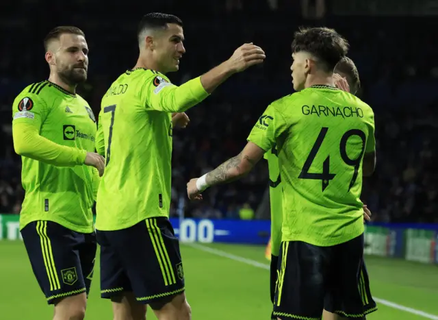 Garnacho and Ronaldo celebrating the goal.