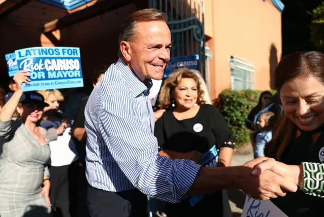 Rick Caruso shaking a supporter's hand