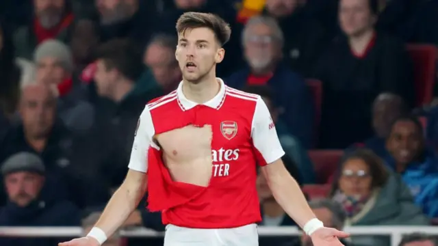 Kieran Tierney with his ripped shirt.