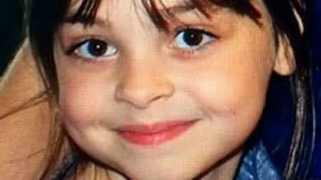 Saffie-Rose Roussos smiling to the camera