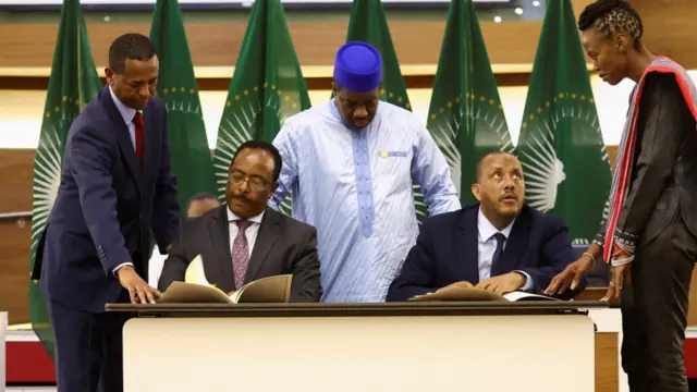 Ethiopian government representative Redwan Hussien and Tigray delegate Getachew Reda attend signing of the AU-led negotiations to resolve the conflict in northern Ethiopia, in Pretoria, South Africa, November 2, 2022