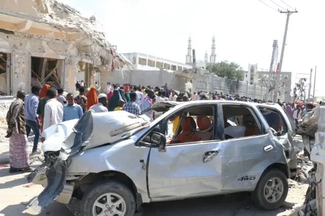 A damaged car in the aftermath of two explosions in Mogadishu, Somalia, 30 October 2022