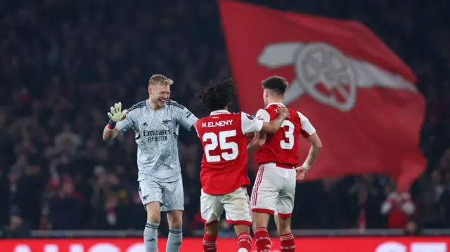 Kieran Tierney celebrates his goal with his team mates.