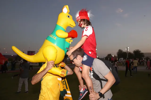 An Australia fan and a Denmark fan